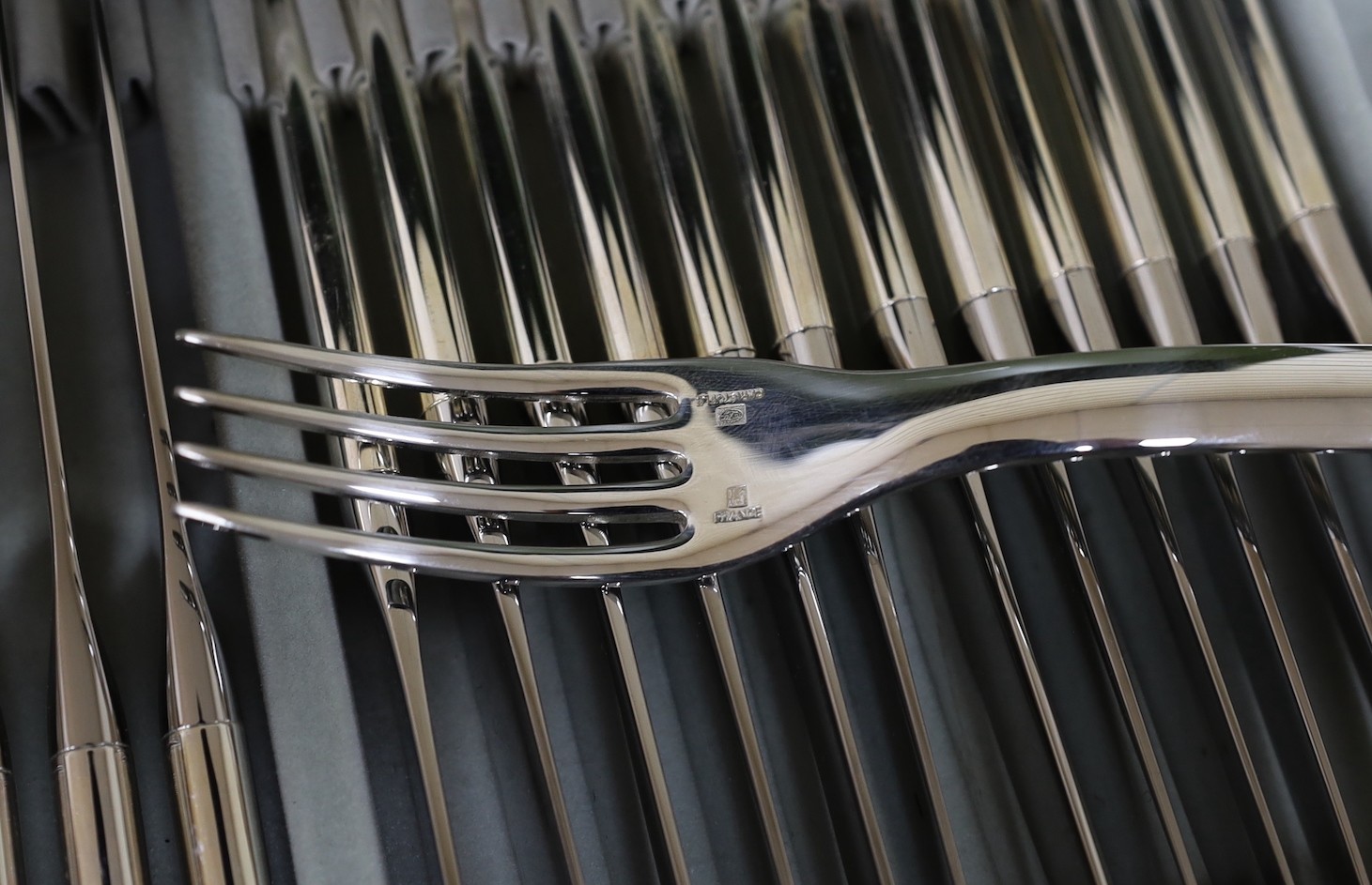 A Cristofle silver plated canteen of cutlery, comprising 84 items, in two trays.